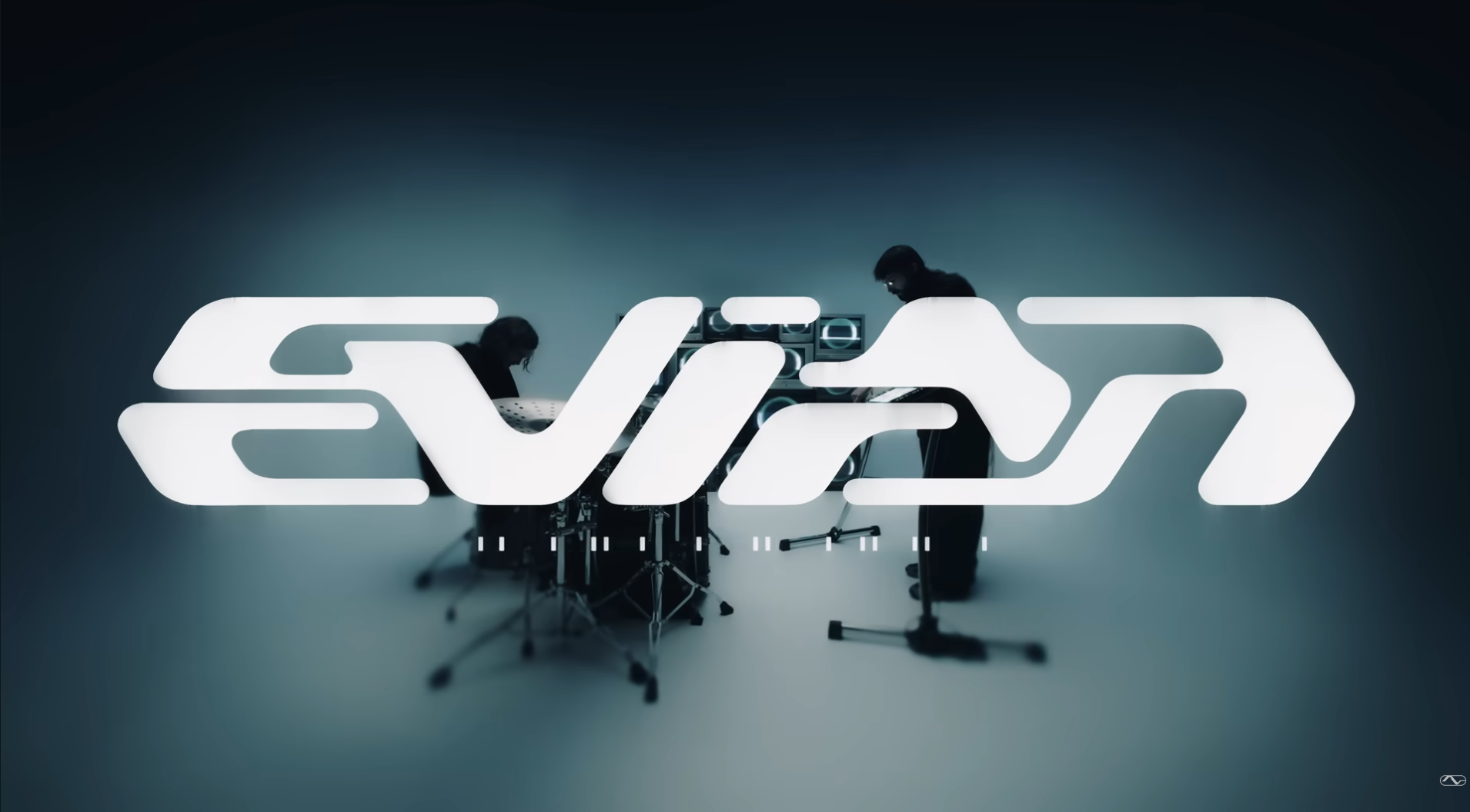 Screenshot from the music video for the song Evian that says "Evian" in the center.